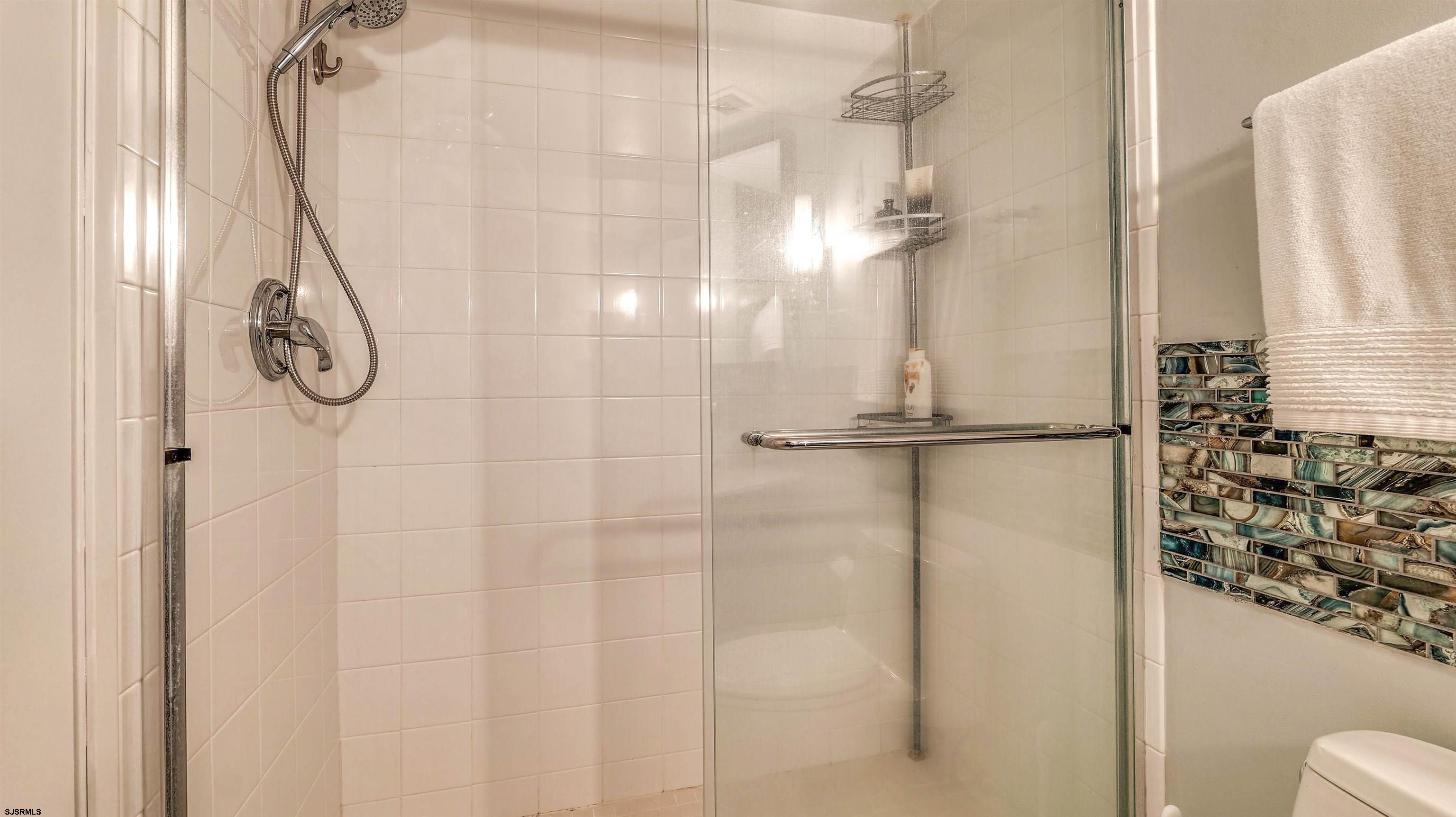 526 Pacific Avenue, Unit 903 Atlantic City, NJ 08401 - Photo 24 of 43 a bathroom with a shower