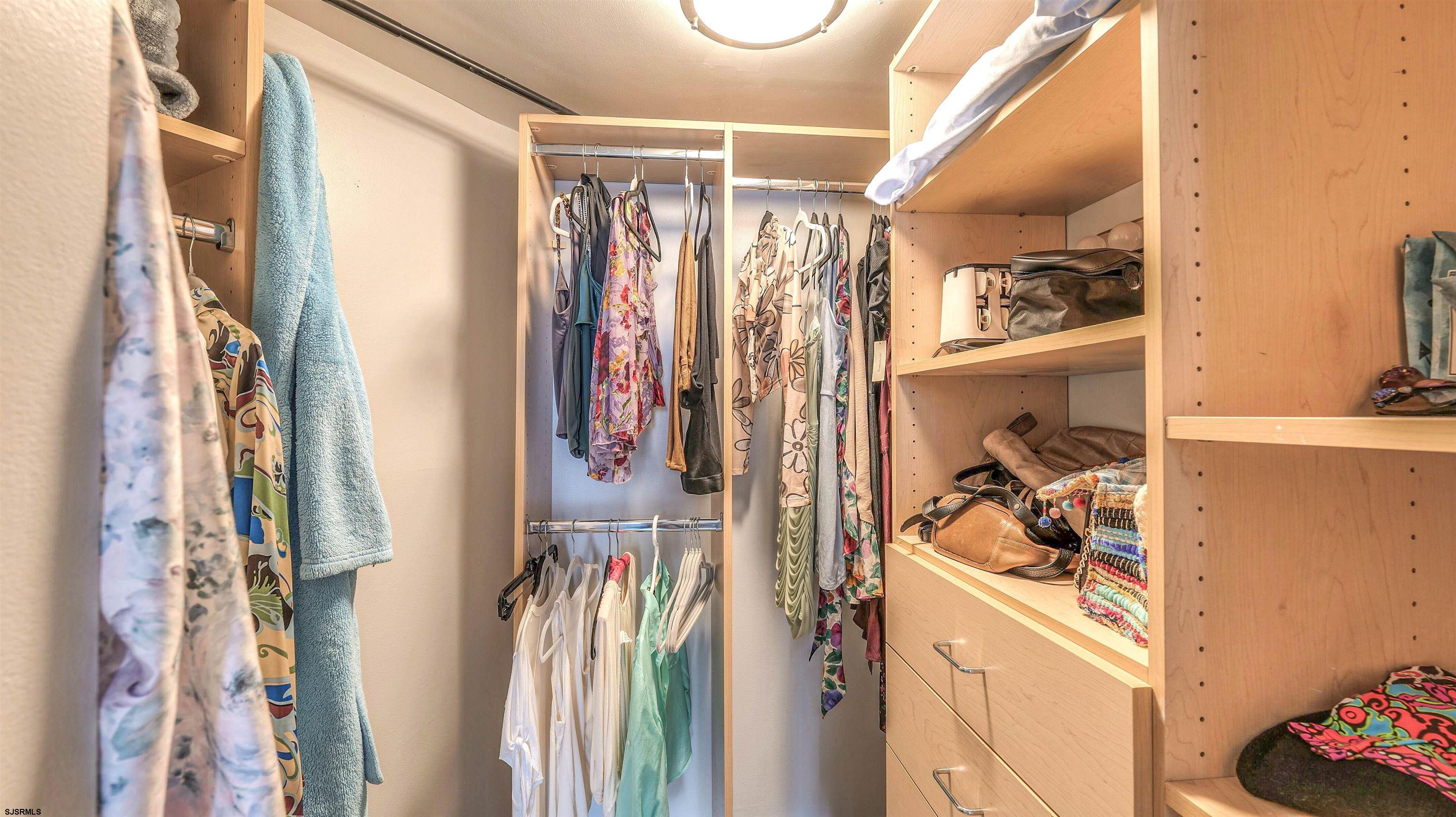 526 Pacific Avenue, Unit 903 Atlantic City, NJ 08401 - Photo 25 of 43 a view of walk in closet with clothes and shoes