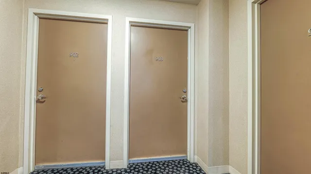 a view of a bathroom from the hallway