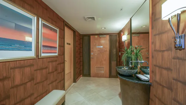 a view of a chairs and table in a room
