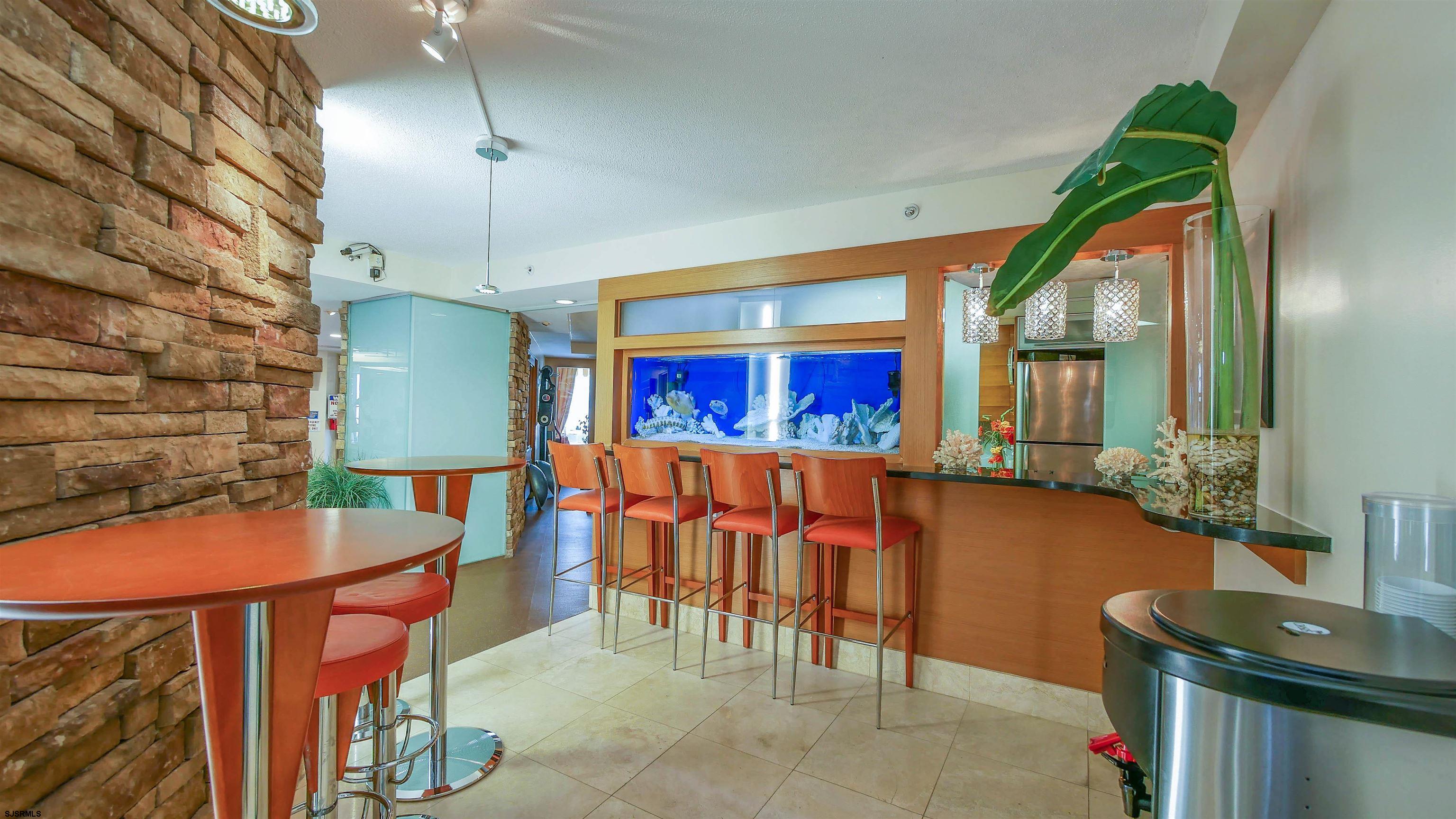 526 Pacific Avenue, Unit 903 Atlantic City, NJ 08401 - Photo 43 of 43 a view of a chairs and table in a room