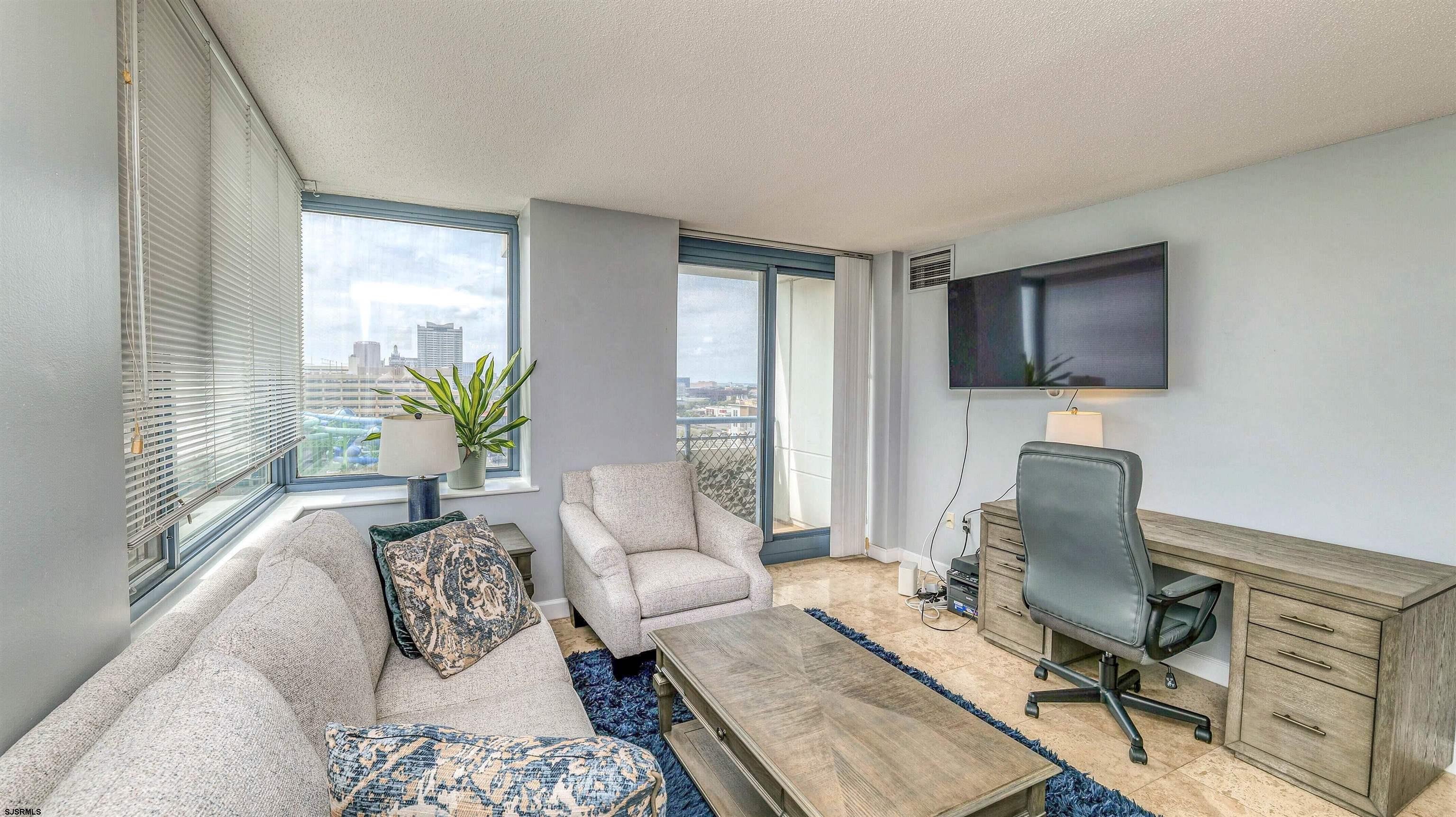 526 Pacific Avenue, Unit 903 Atlantic City, NJ 08401 - Photo 5 of 43 a workspace with furniture and a window