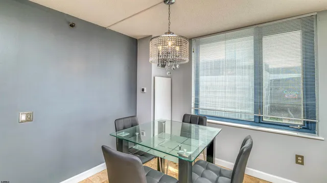 a view of a balcony with an outdoor seating