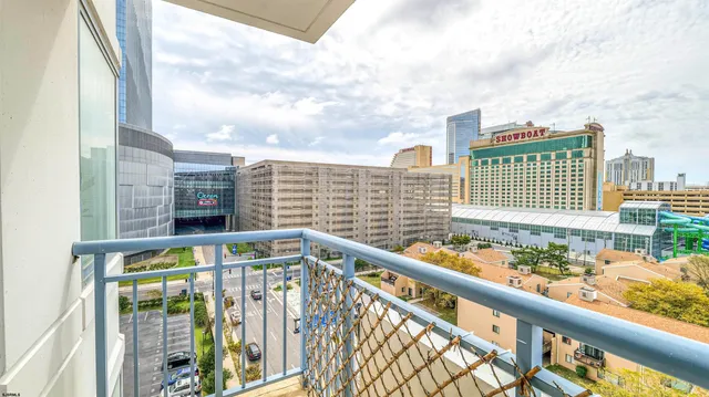 a view of a city skyline from a balcony