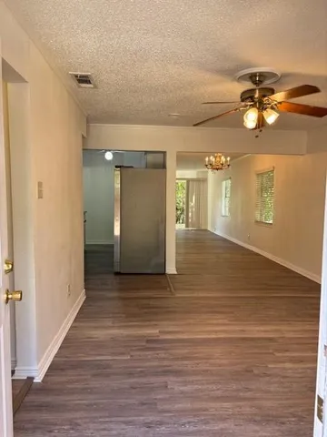 a view of a livingroom with a wooden floor