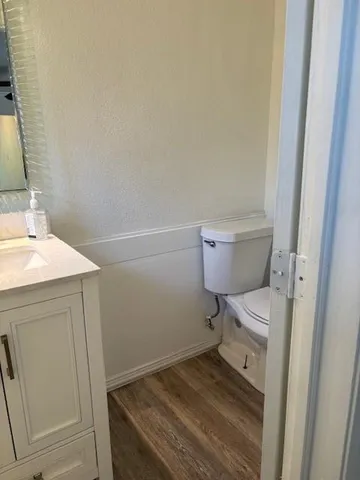 a bathroom with a sink and a toilet