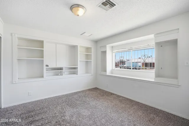 an empty room with a window