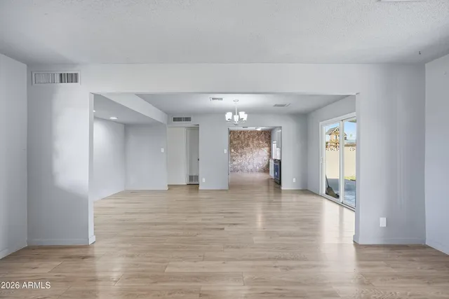 a view of an empty room and window