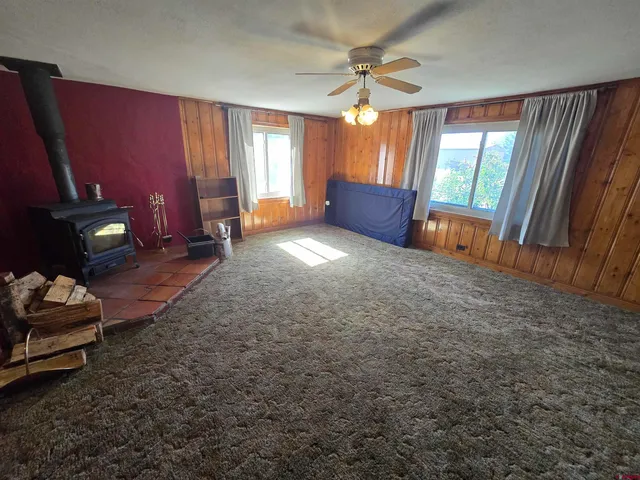a view of livingroom with furniture and a chandelier