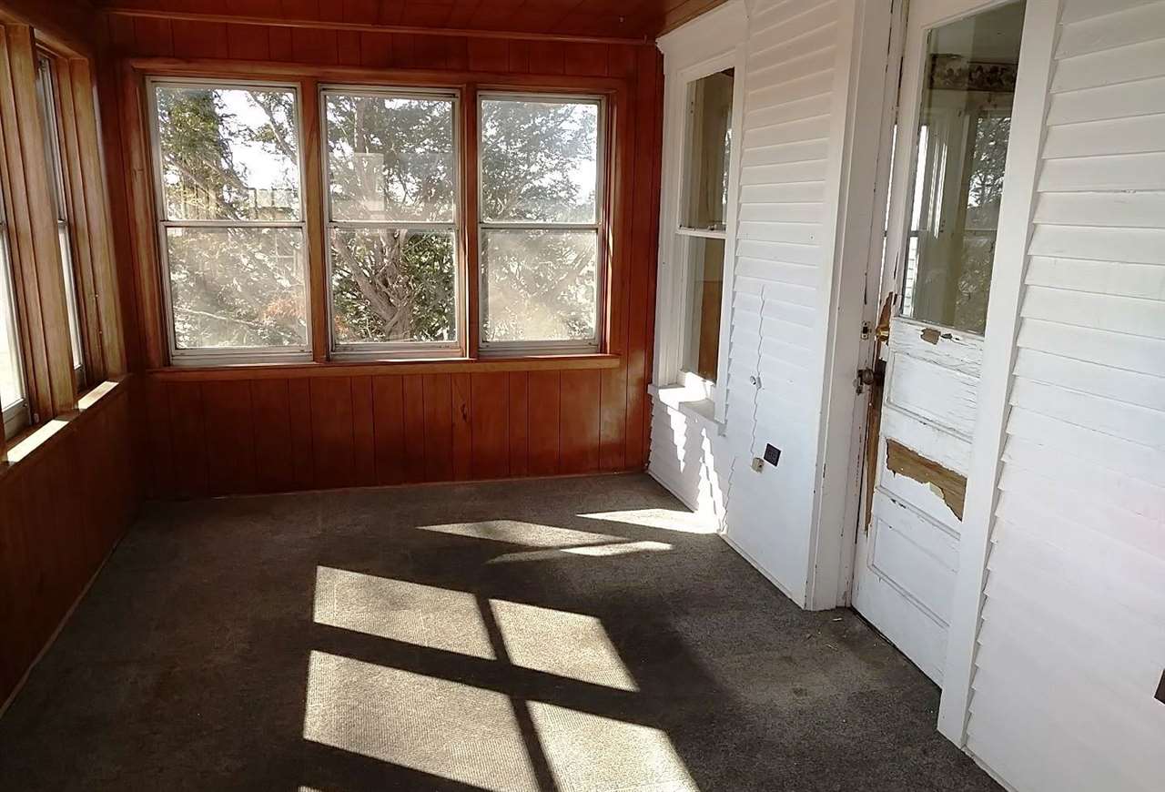 4287 South Freeport Road Polo, IL 61064 - Photo 2 of 11 a view of wooden floor in a hall with an entryway