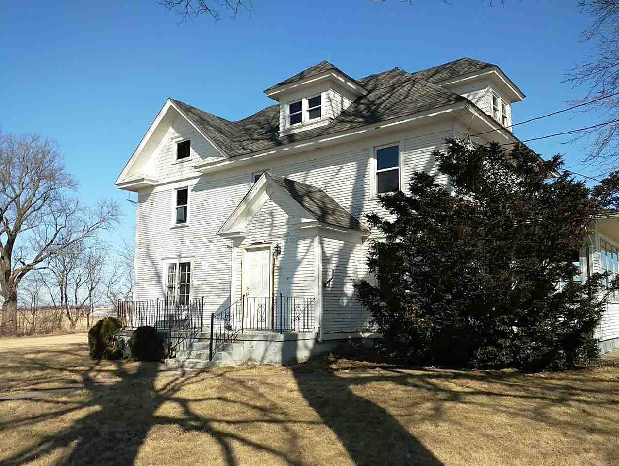 4287 South Freeport Road Polo, IL 61064 - Photo 9 of 11 a front view of a house with a yard
