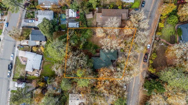 an aerial view of residential house with outdoor space