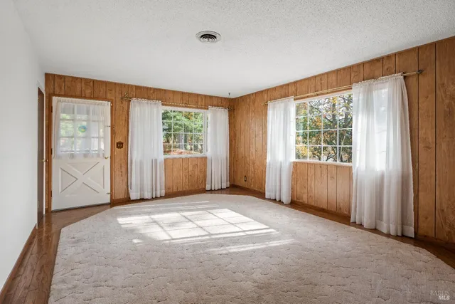 an empty room with windows