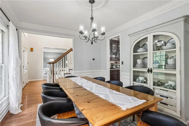 a kitchen with stainless steel appliances granite countertop a sink and a stove
