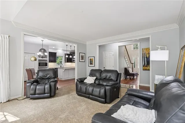 a bedroom with a bed and a television