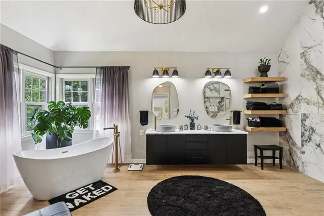 an aerial view of residential house with outdoor space and swimming pool