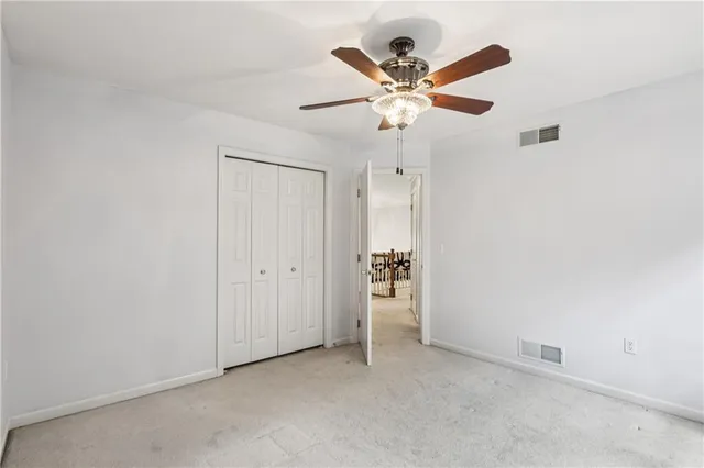 a picture of a bathroom with a shower
