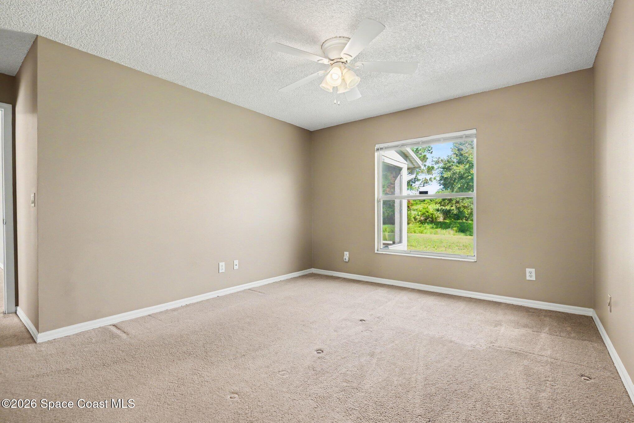 1154 Ida Way Melbourne, FL 32940 - Photo 17 of 27 Primary Bedroom