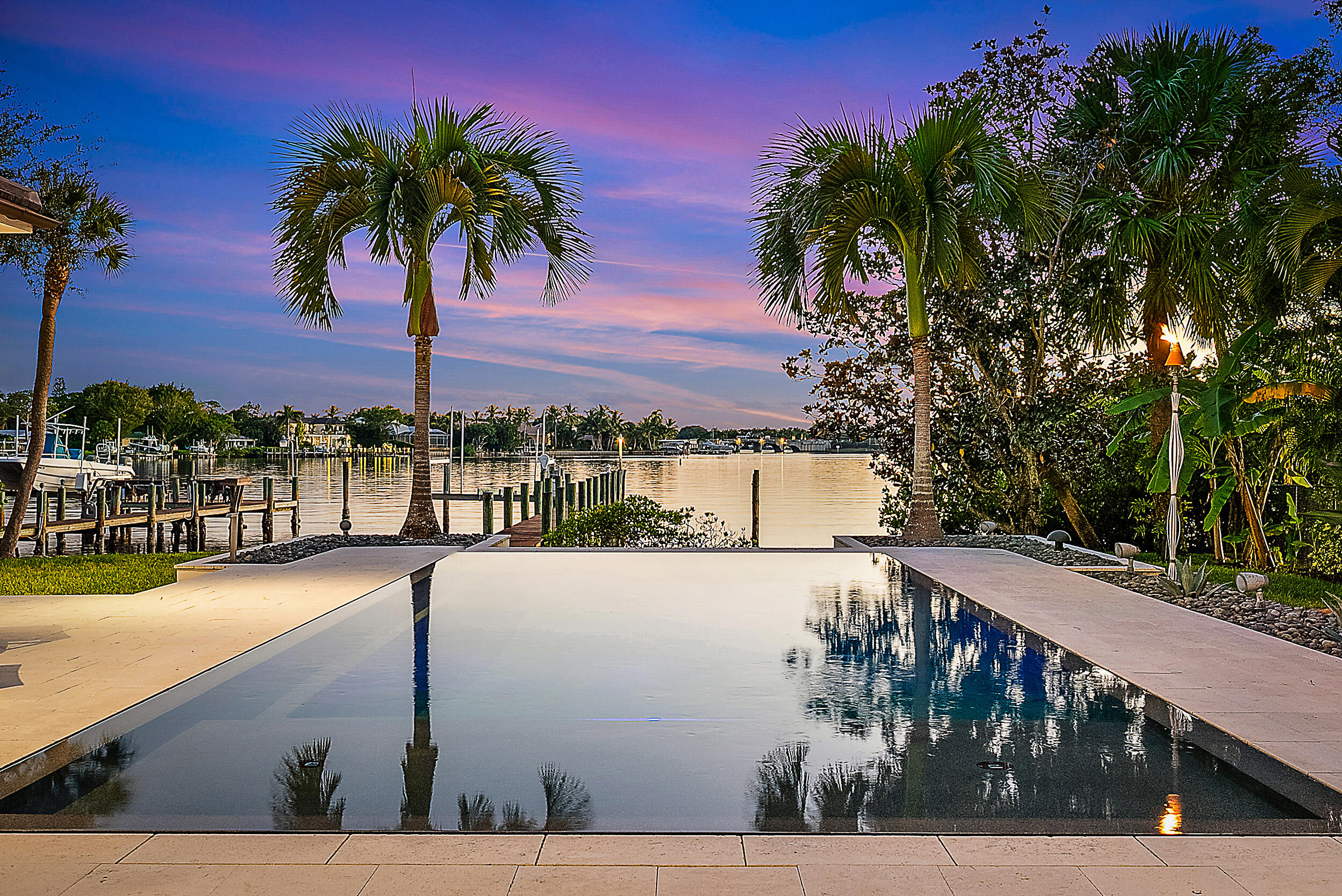 19651 North Riverside Drive Jupiter, FL 33469 - Photo 2 of 37 a view of swimming pool with furniture