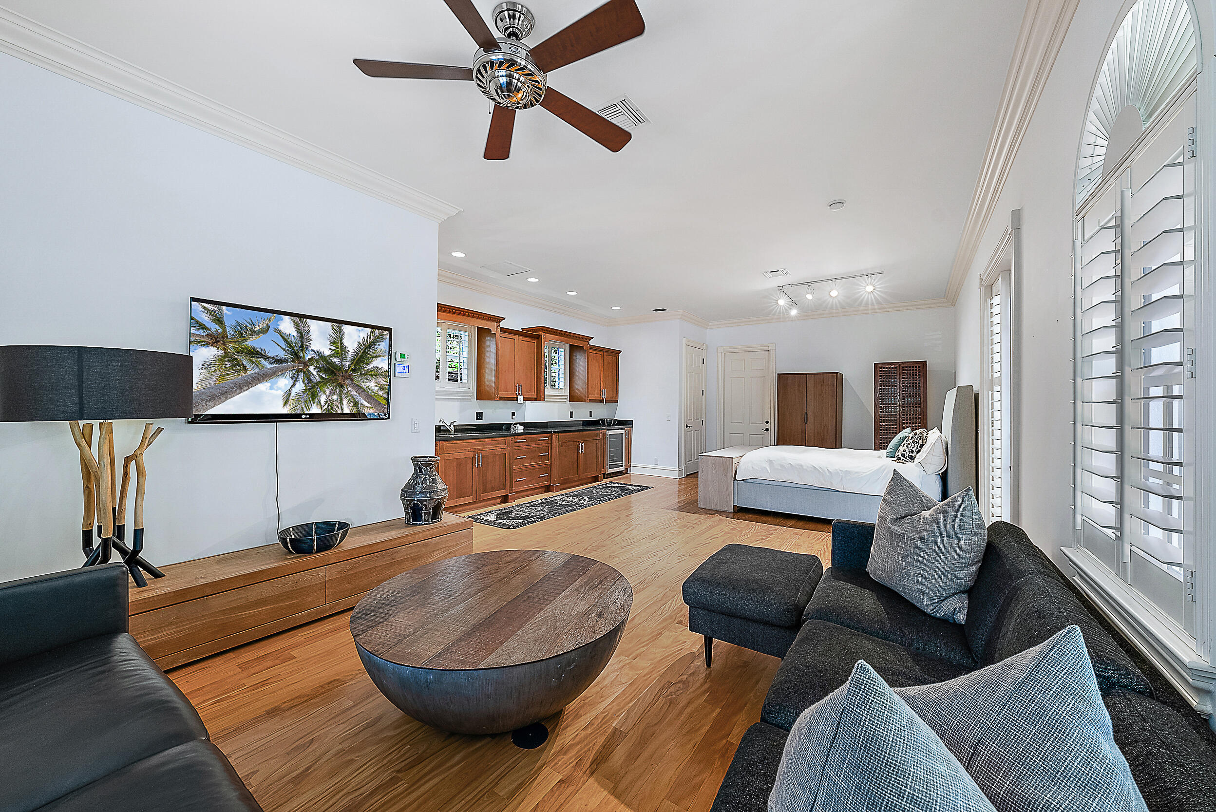 19651 North Riverside Drive Jupiter, FL 33469 - Photo 28 of 37 a living room with furniture and a flat screen tv