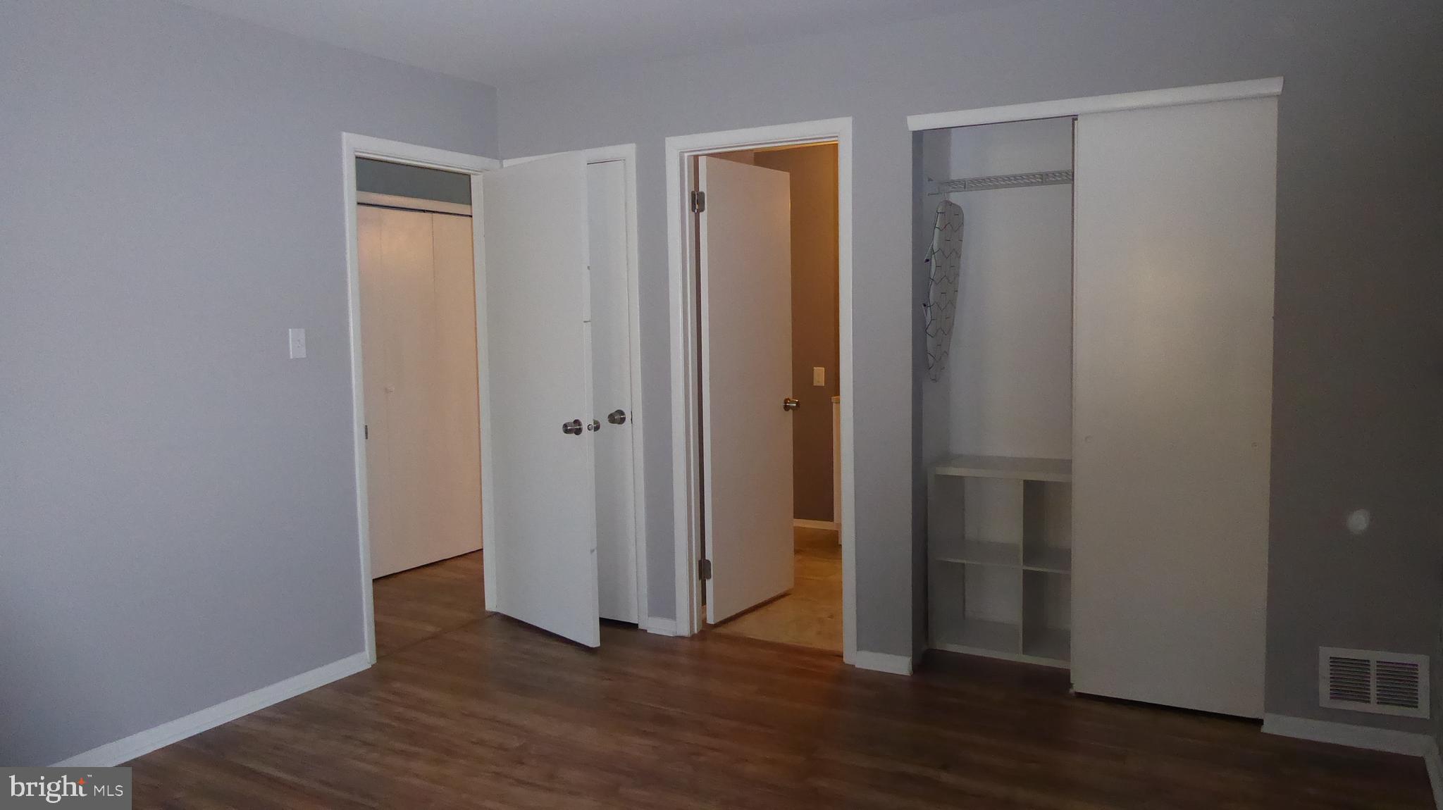 4 Hamilton Court Berlin, NJ 08009 - Photo 22 of 46 an empty room with wooden floor and closet