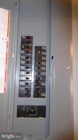 a view of a livingroom with furniture and closet