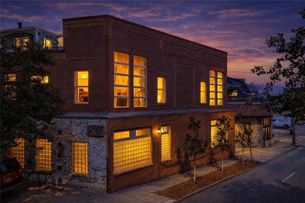 205 Walker Street Southwest, Unit G8 Atlanta, GA 30313 - Photo 1 of 41 a front view of a house