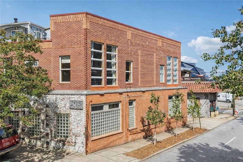205 Walker Street Southwest, Unit G8 Atlanta, GA 30313 - Photo 2 of 41 a front view of a building