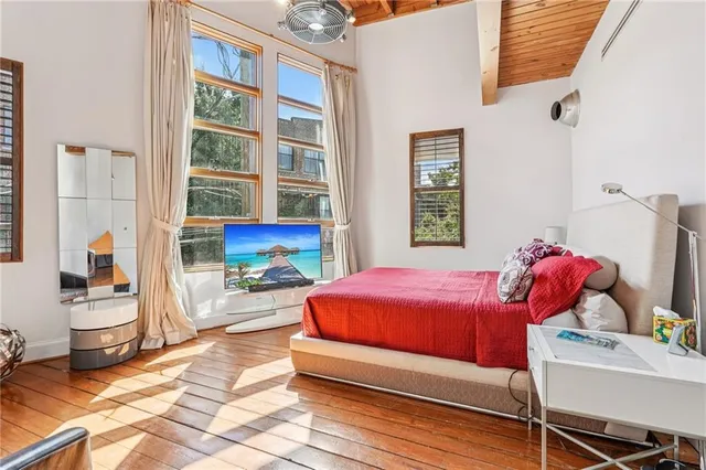 a bathroom with a toilet a sink and a mirror