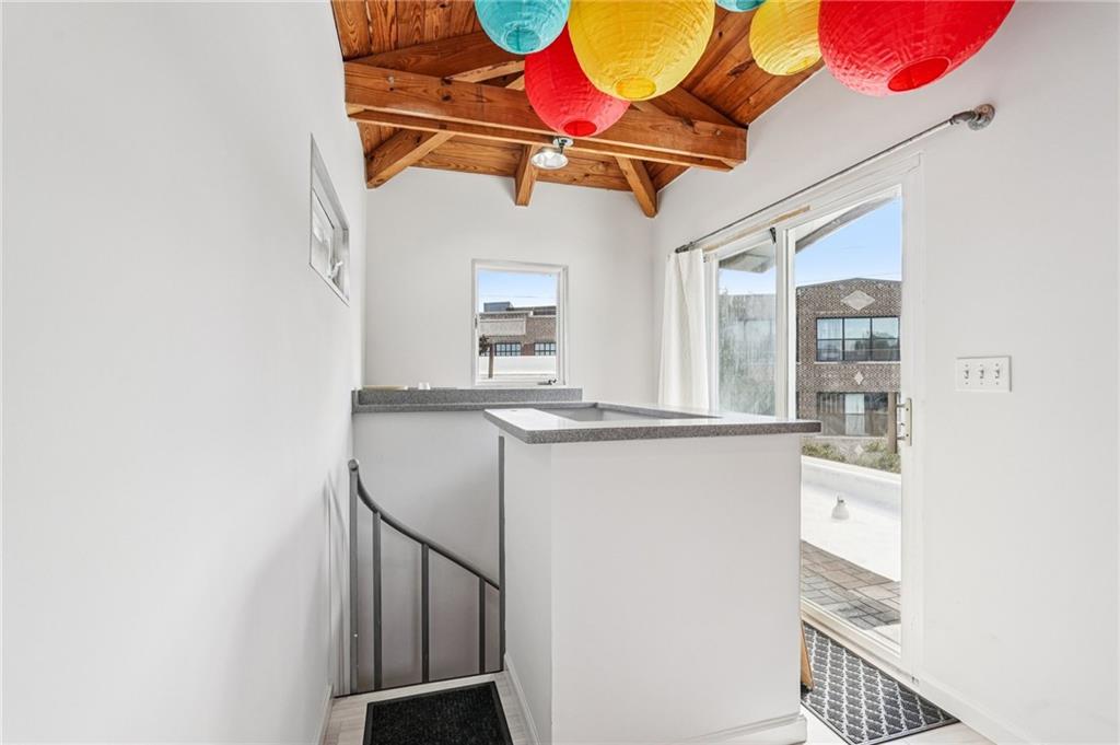 205 Walker Street Southwest, Unit G8 Atlanta, GA 30313 - Photo 37 of 41 a view of entryway and kitchen