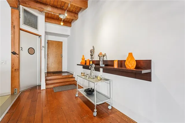 a living room with furniture or outdoor space with wooden floor