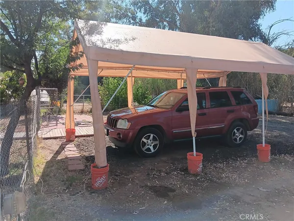 a car parked in front of a house