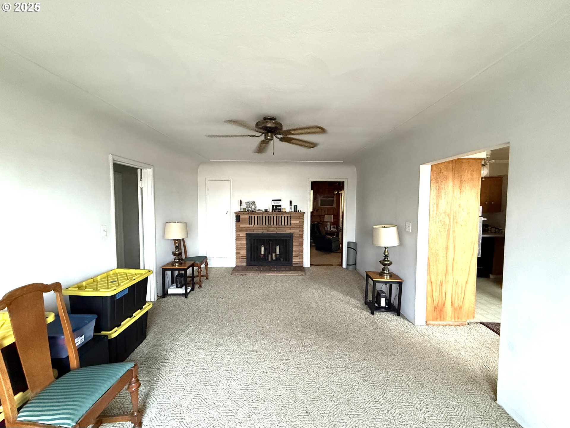 2076 Roberts Road Medford, OR 97504 - Photo 11 of 29 a view of a livingroom with furniture and a fireplace