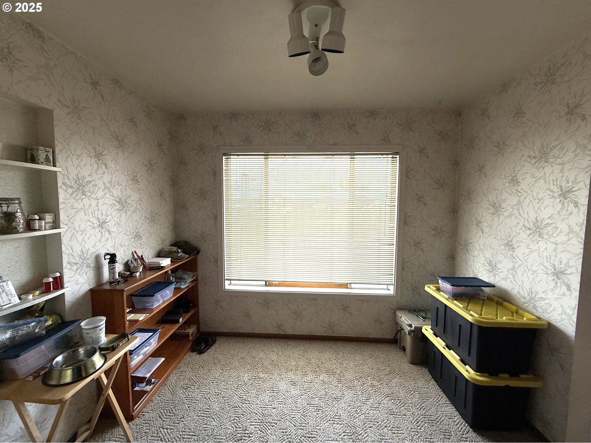 2076 Roberts Road Medford, OR 97504 - Photo 14 of 29 a view of a workspace with furniture and a window