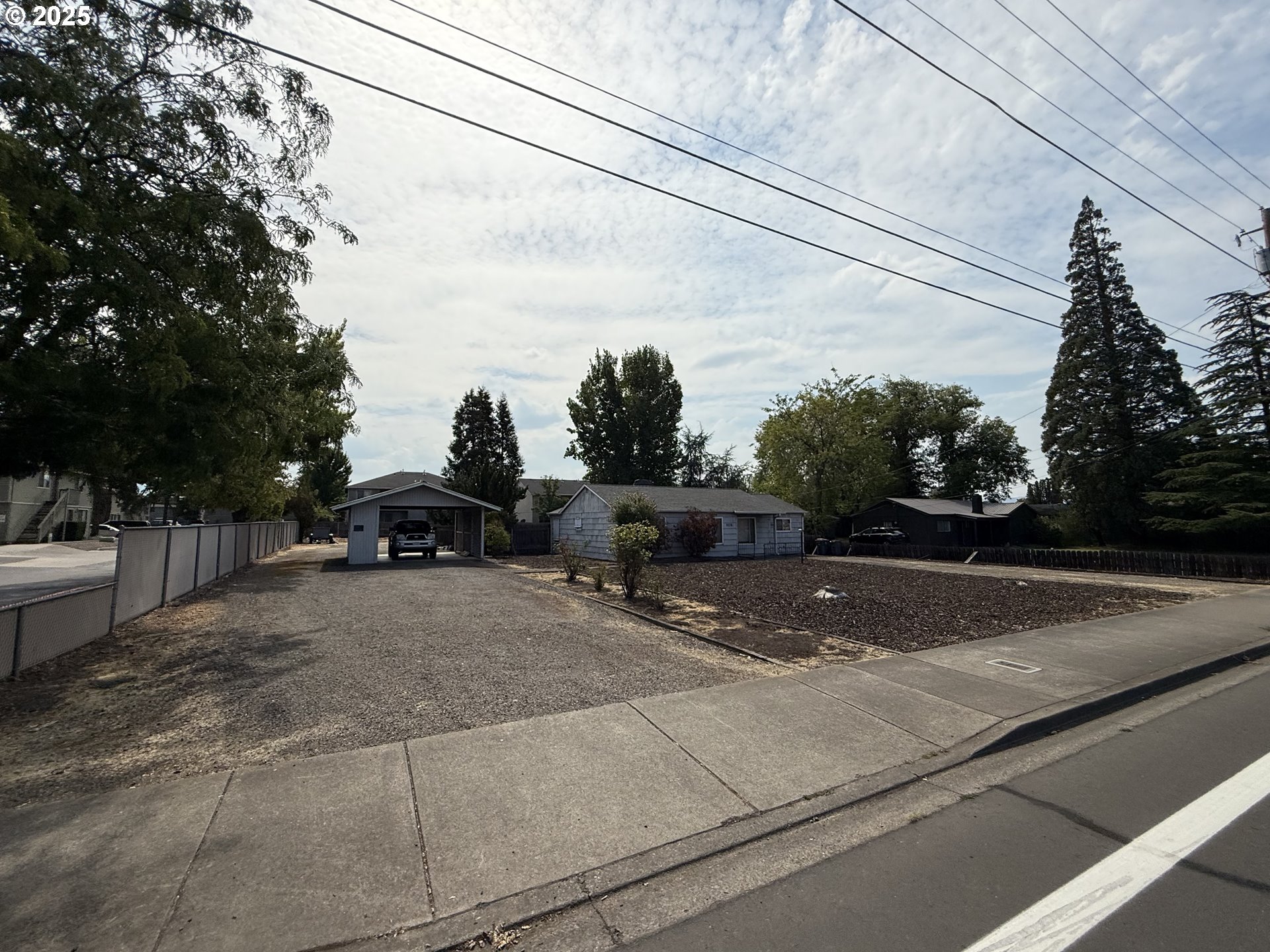 2076 Roberts Road Medford, OR 97504 - Photo 29 of 29 a view of a yard with cars on road