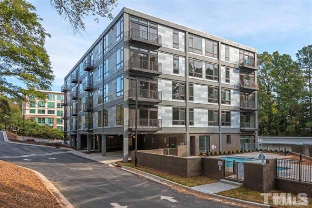 a front view of a building with balcony
