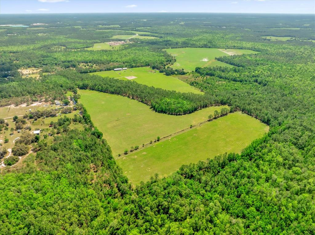 0 Alligator Road Clermont, FL 34714 - Photo 23 of 44 a view of a field with an ocean view