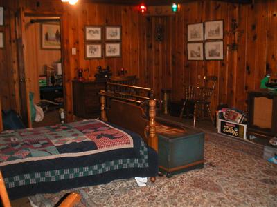 3675 Happy Valley Road Santa Rosa, CA 95404 - Photo 8 of 11 a bedroom with a bed a table and chair