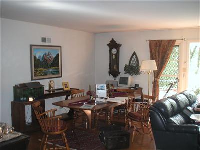 3675 Happy Valley Road Santa Rosa, CA 95404 - Photo 10 of 11 a living room with furniture a large window and a table