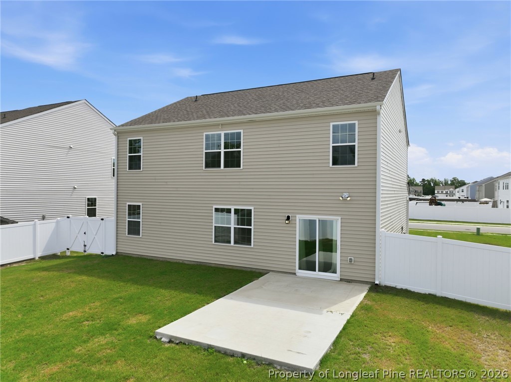 2208 Clydesmill Road Fayetteville, NC 28314 - Photo 2 of 26 a view of an house with backyard space and garden