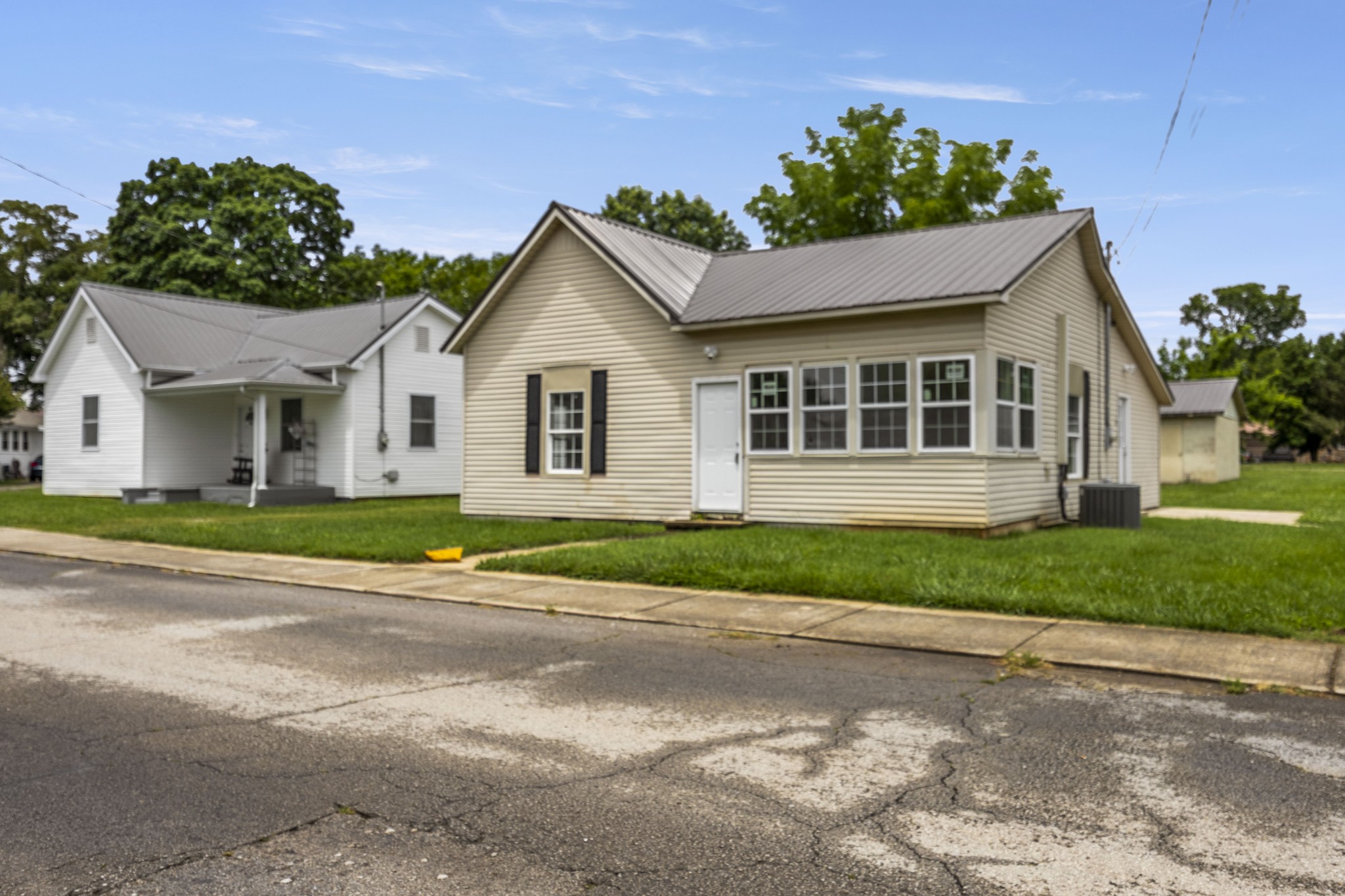 front view of a house with a street