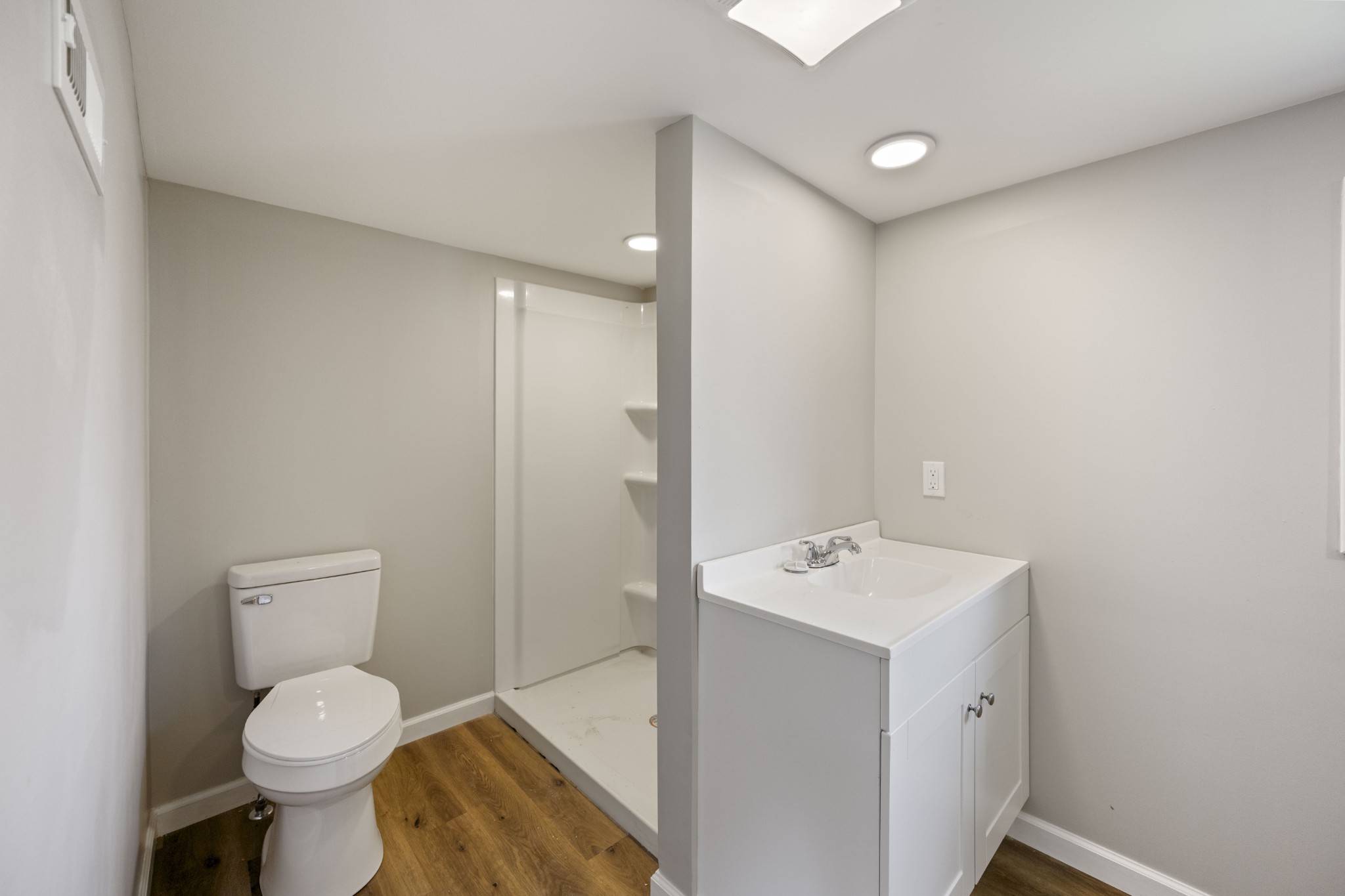 102 Hodges Street North Cowan, TN 37318 - Photo 17 of 23 a bathroom with a toilet sink and mirror