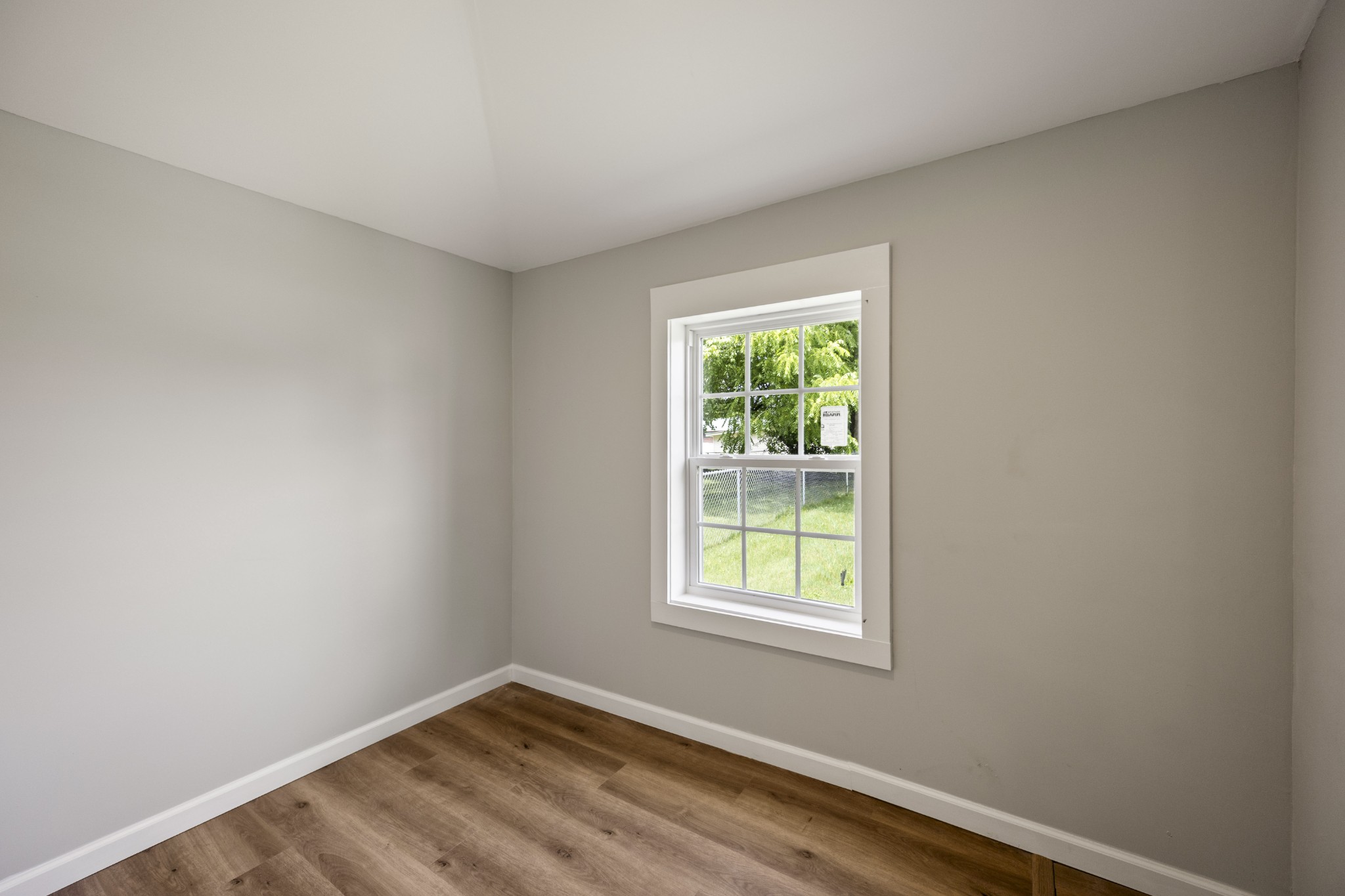 102 Hodges Street North Cowan, TN 37318 - Photo 21 of 23 an empty room with a window