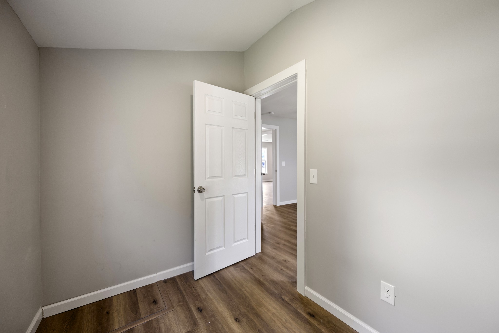 102 Hodges Street North Cowan, TN 37318 - Photo 22 of 23 a view of a hallway with wooden floor