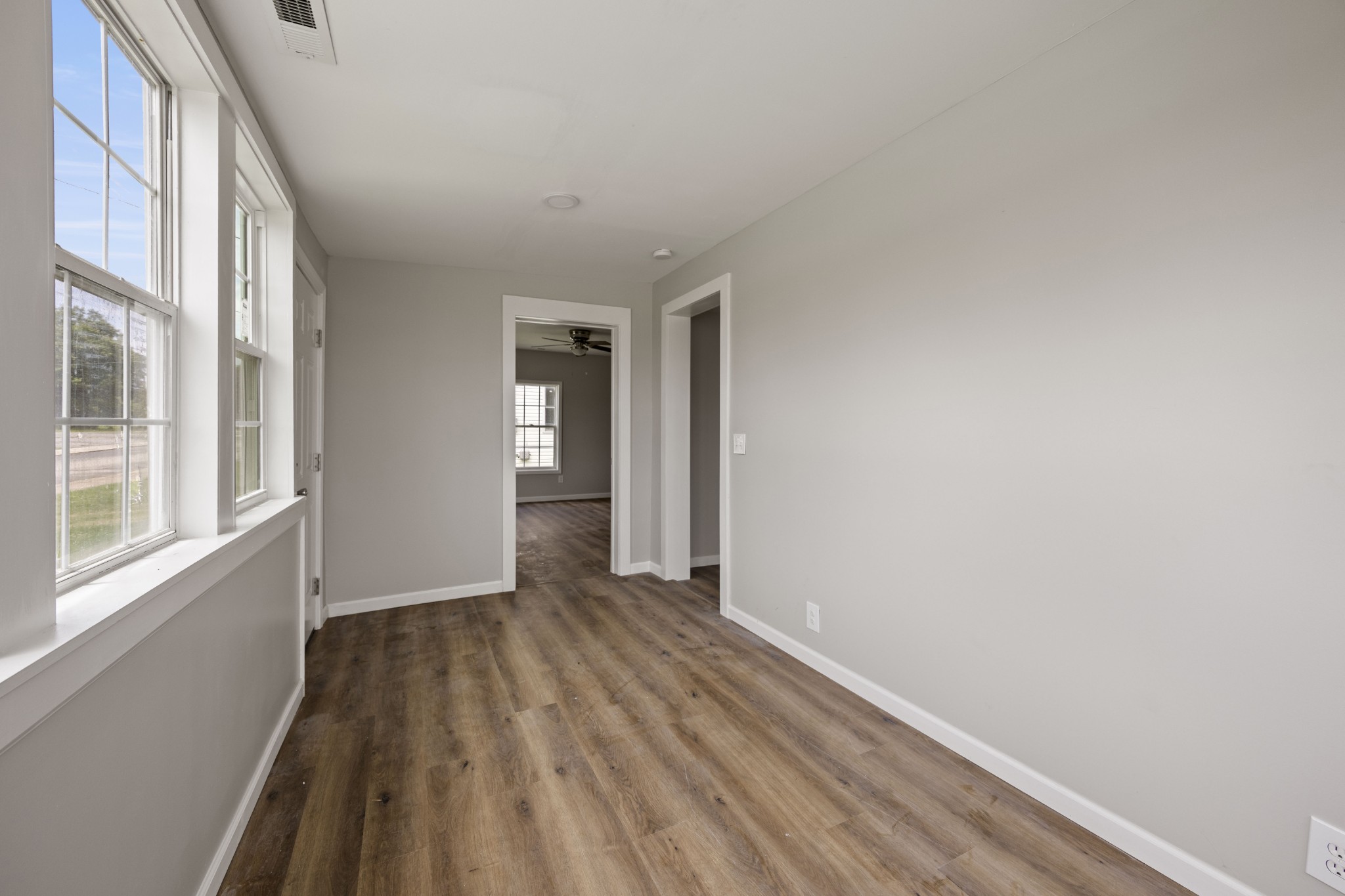 102 Hodges Street North Cowan, TN 37318 - Photo 4 of 23 a view of an empty room with glass door