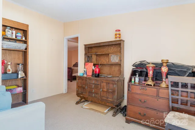 a bed room with a bed and a tv