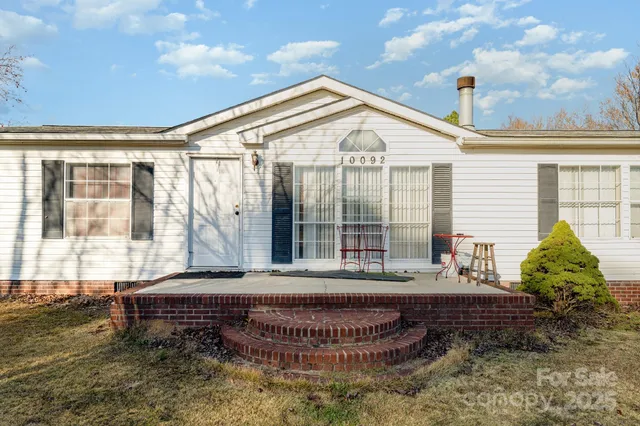 a bedroom with furniture and window