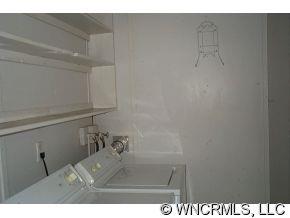 60 Osborne Farm Road Canton, NC 28716 - Photo 12 of 12 a bathroom with a sink and vanity