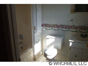 60 Osborne Farm Road Canton, NC 28716 - Photo 10 of 12 a bathroom with a toilet and a sink