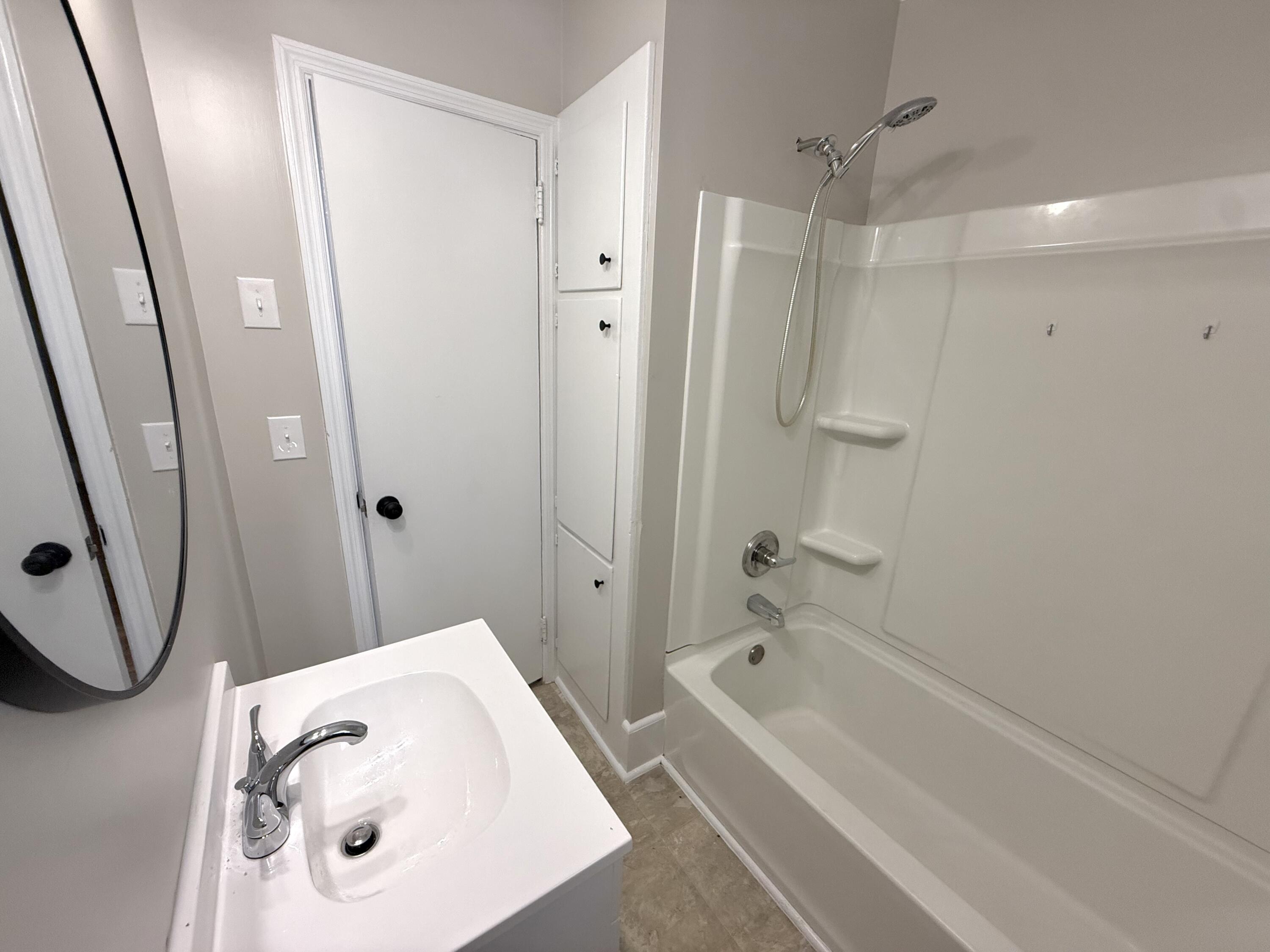 6 Thomas Drive Sumter, SC 29150 - Photo 11 of 29 Linen storage in bathroom